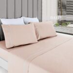 Draps de lit saumonés unis